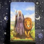 The tarot card Strength, also know as The Crone in this Tarot Deck